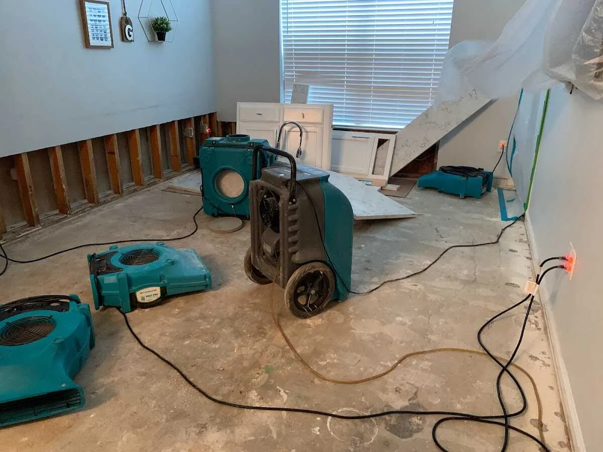 Dehumidifier in flood-cut room for Water Damage Restoration in Covedale
